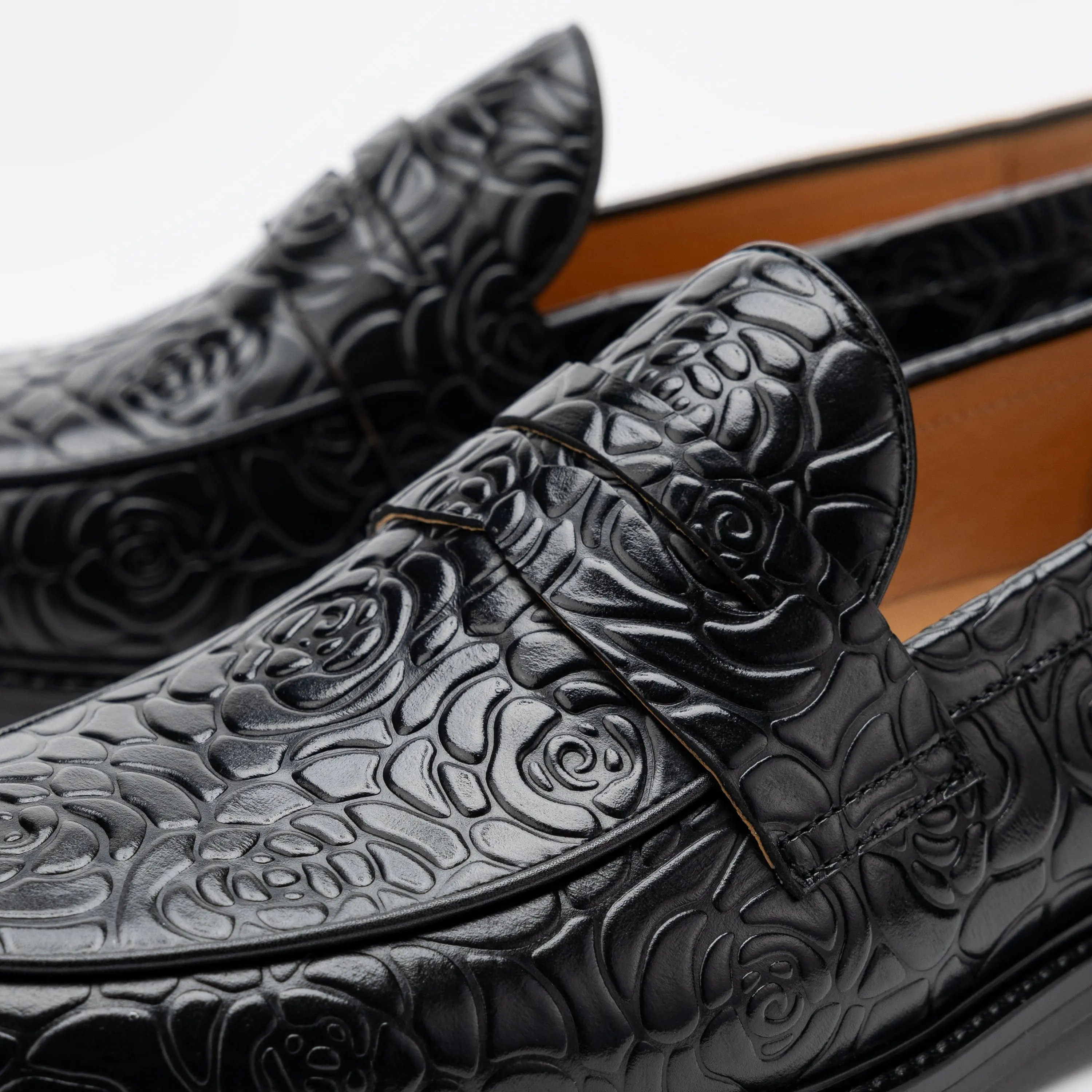 Calum Schwarze Blumen-Penny-Loafer aus Leder