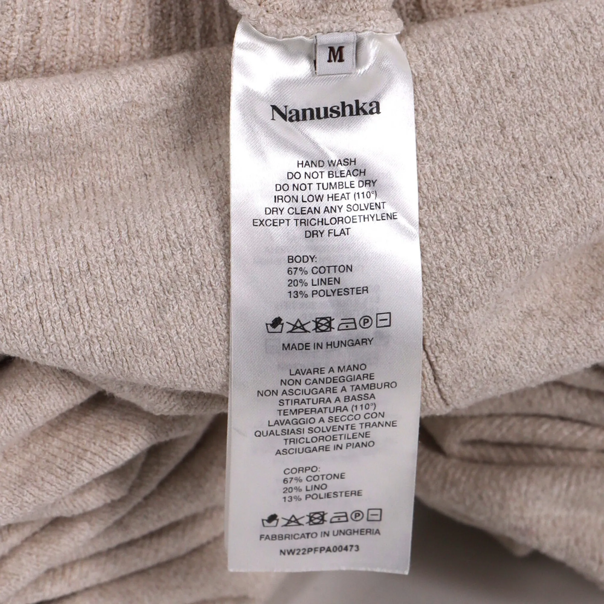 Nanushka Strick-Hochwaist-Glockenhose in beiger Baumwolle