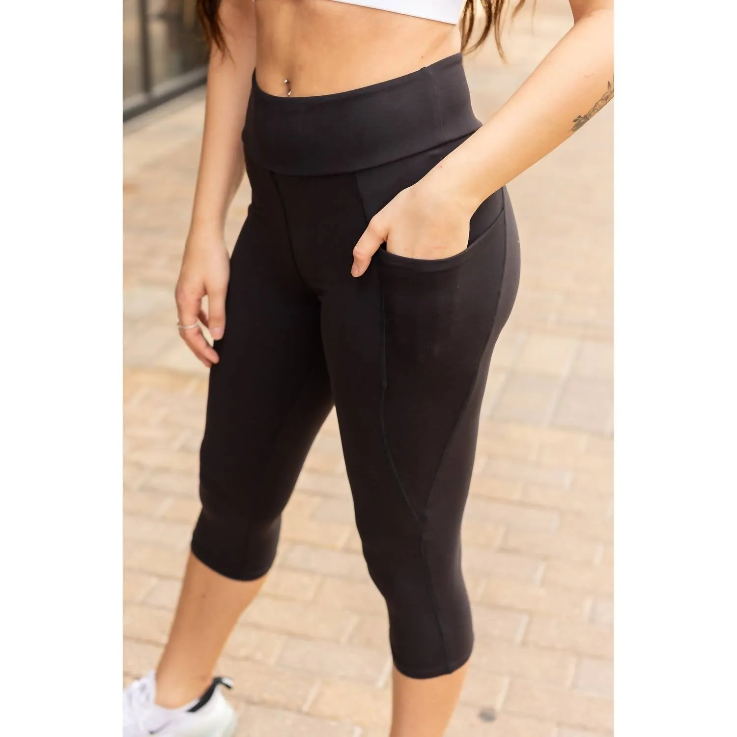Schicke Pocket Capri-Leggings in Schwarz